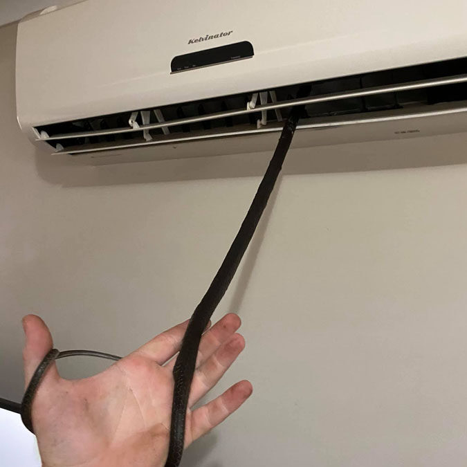Air Conditioner Repair Snake